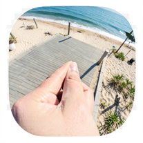 Pinched Reality – Forced-Perspective Beach Candid